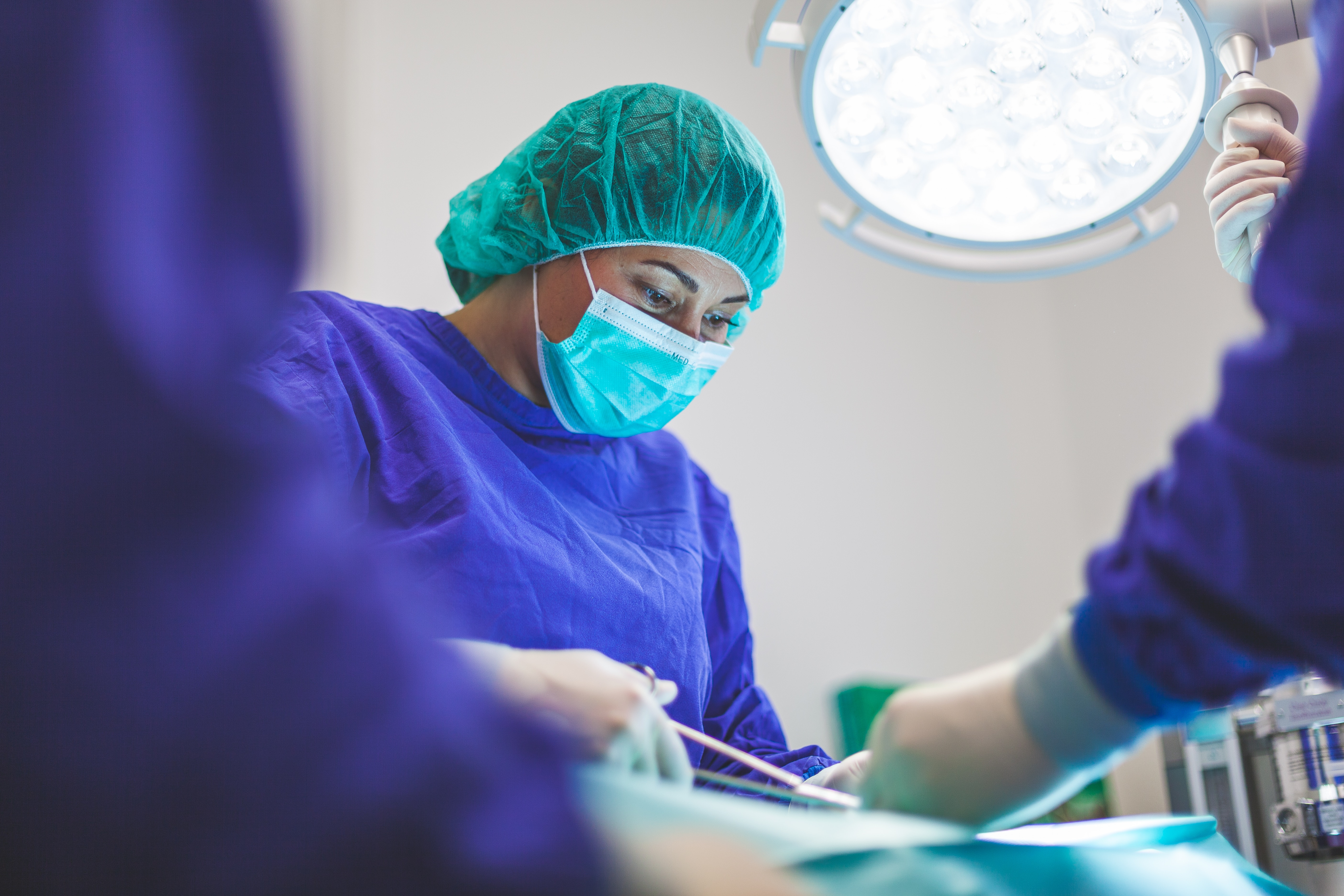 doctors performing surgery