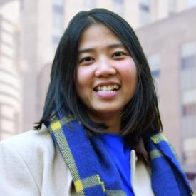 Hong in front of building