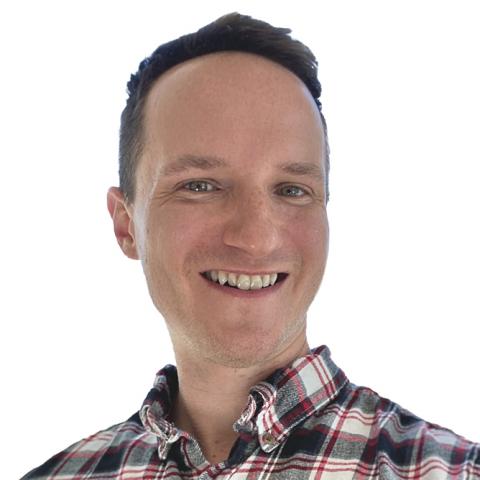 Ben Tinsley's headshot on a white background